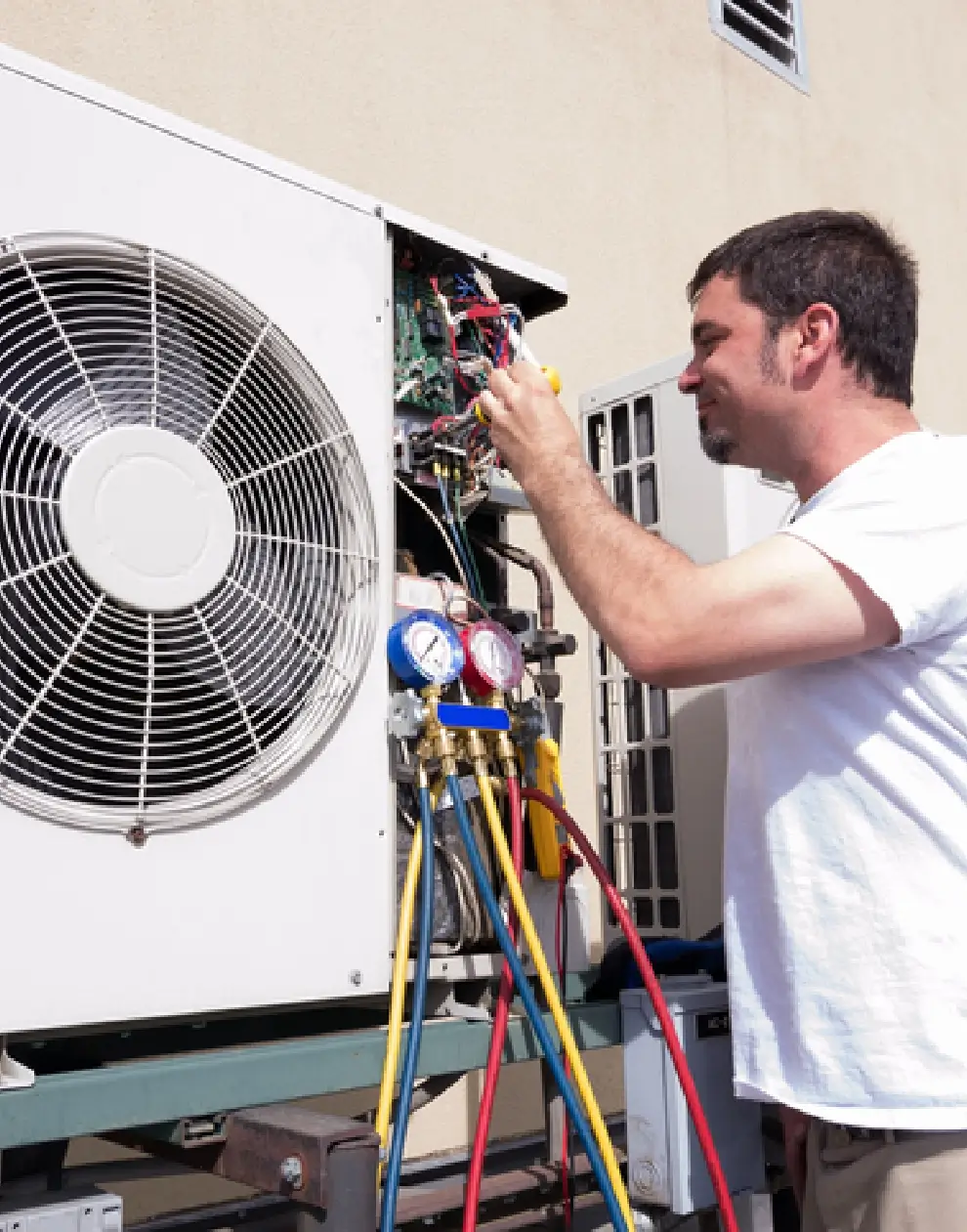 technician servicing a ductless system