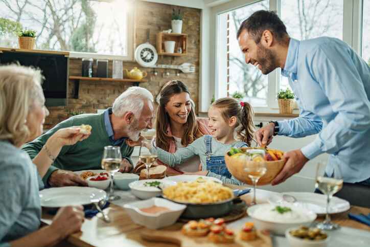 happy family enjoying dinner