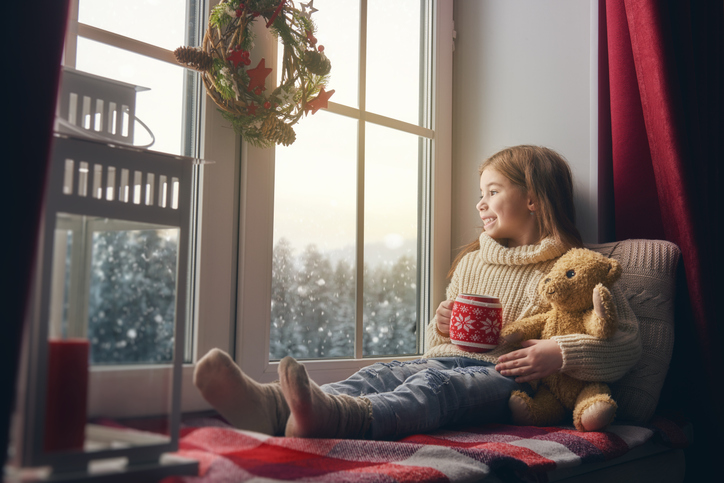 girl sitting by the window