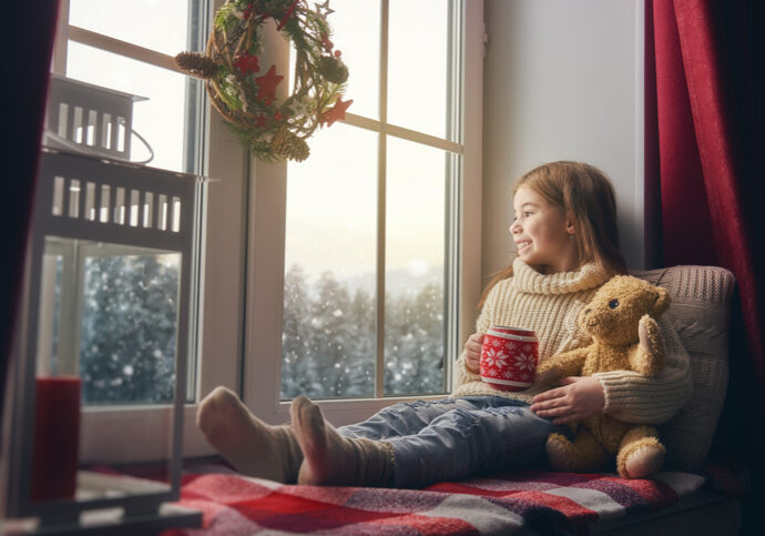 girl sitting by the window